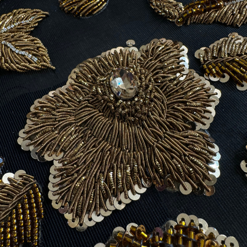 Luxurious Handcrafted Beaded Appliques with ThreadworkLuxurious Handcrafted Beaded Appliques with Threadwork